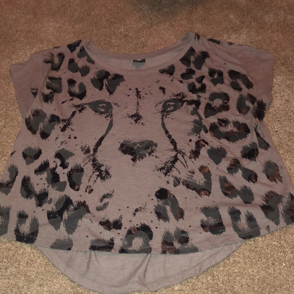 Cheetah print shirt.